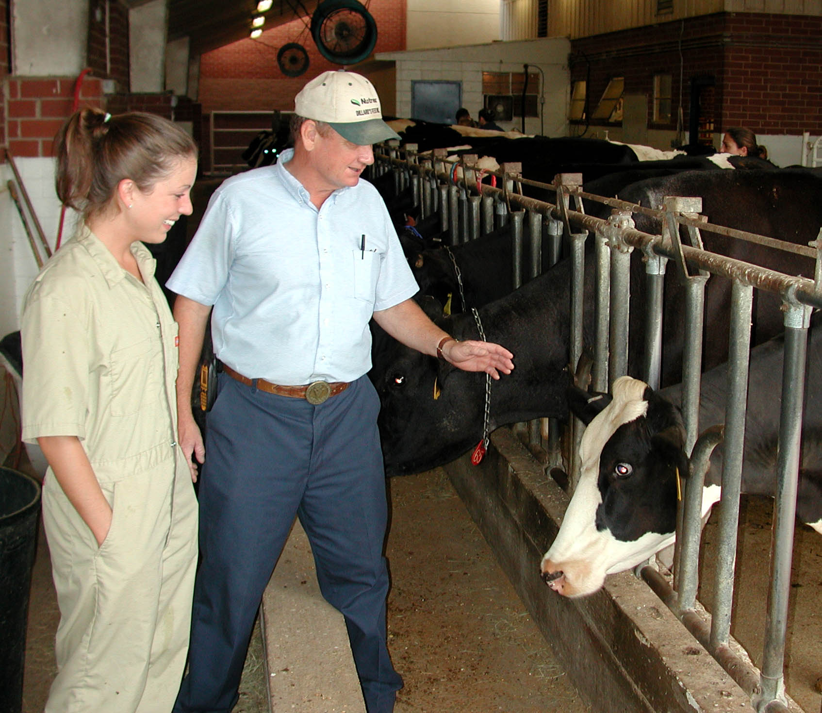 Dr. Carson and student in barn