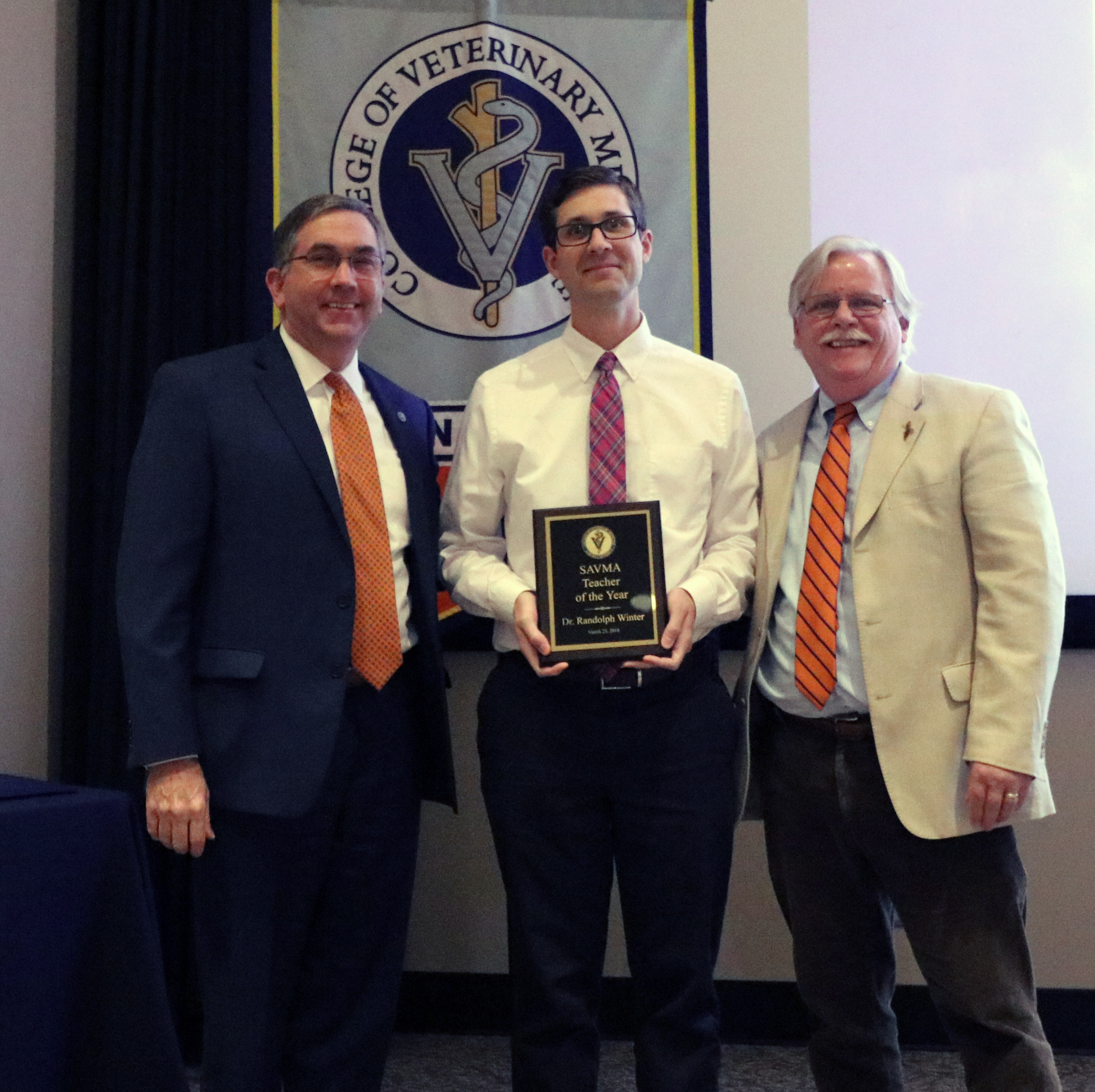 Dean Johnson, Dr. Winter and Dr. Jamie Bellah, who made the presentation.