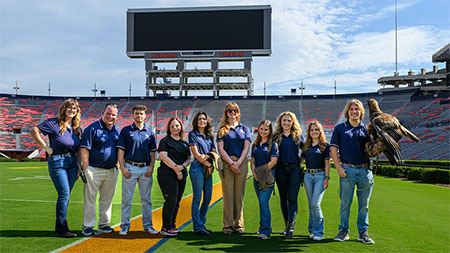 War Eagle flight team on the field