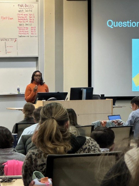 Student presenting in front of group