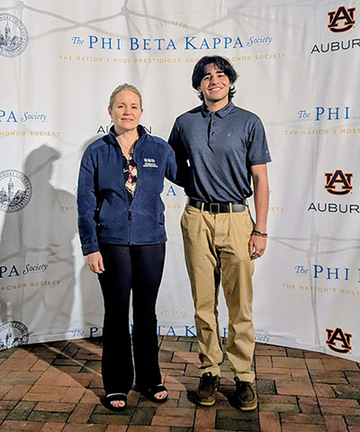 Chris Khalaf (right) poses with PAOH program Co-Director and Assistant Clinical Professor Kelley Steury