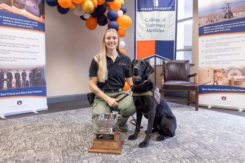 Woman with black lab